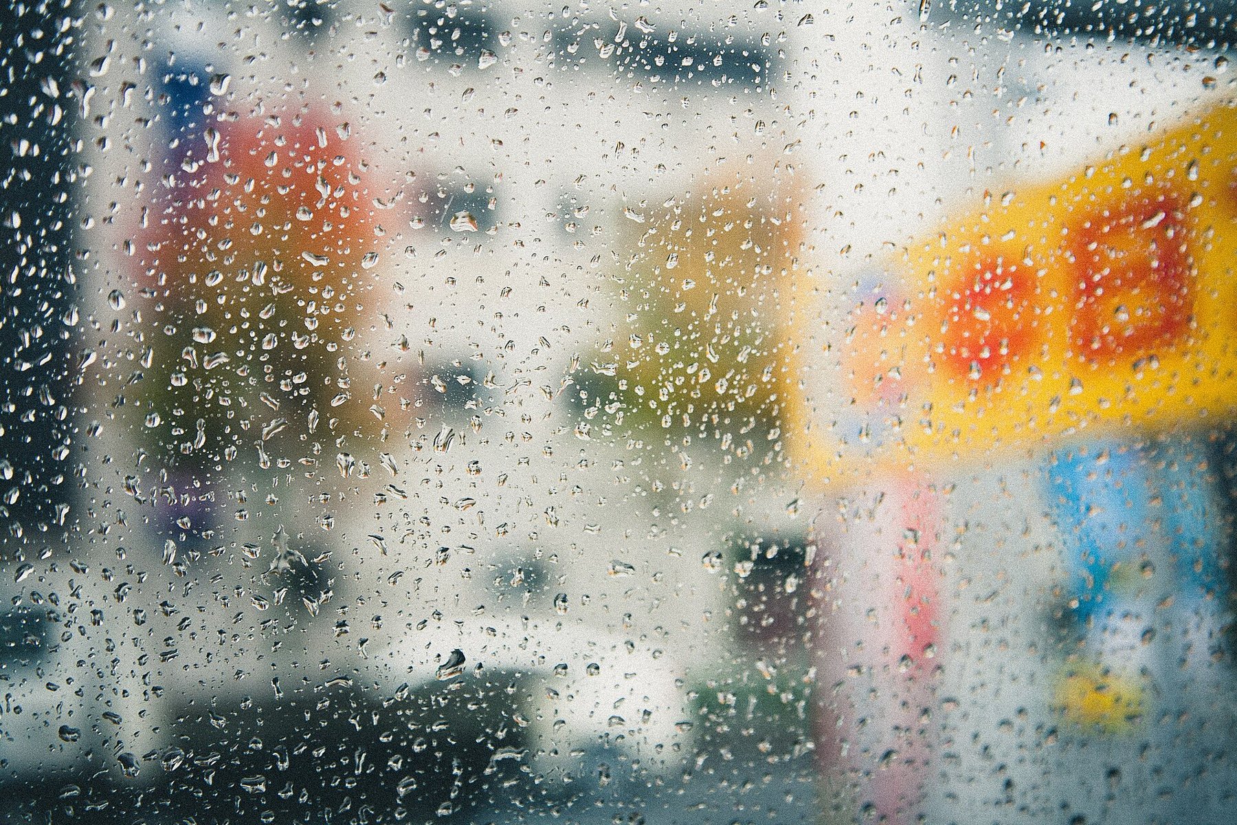 Raindrops on a window pane.