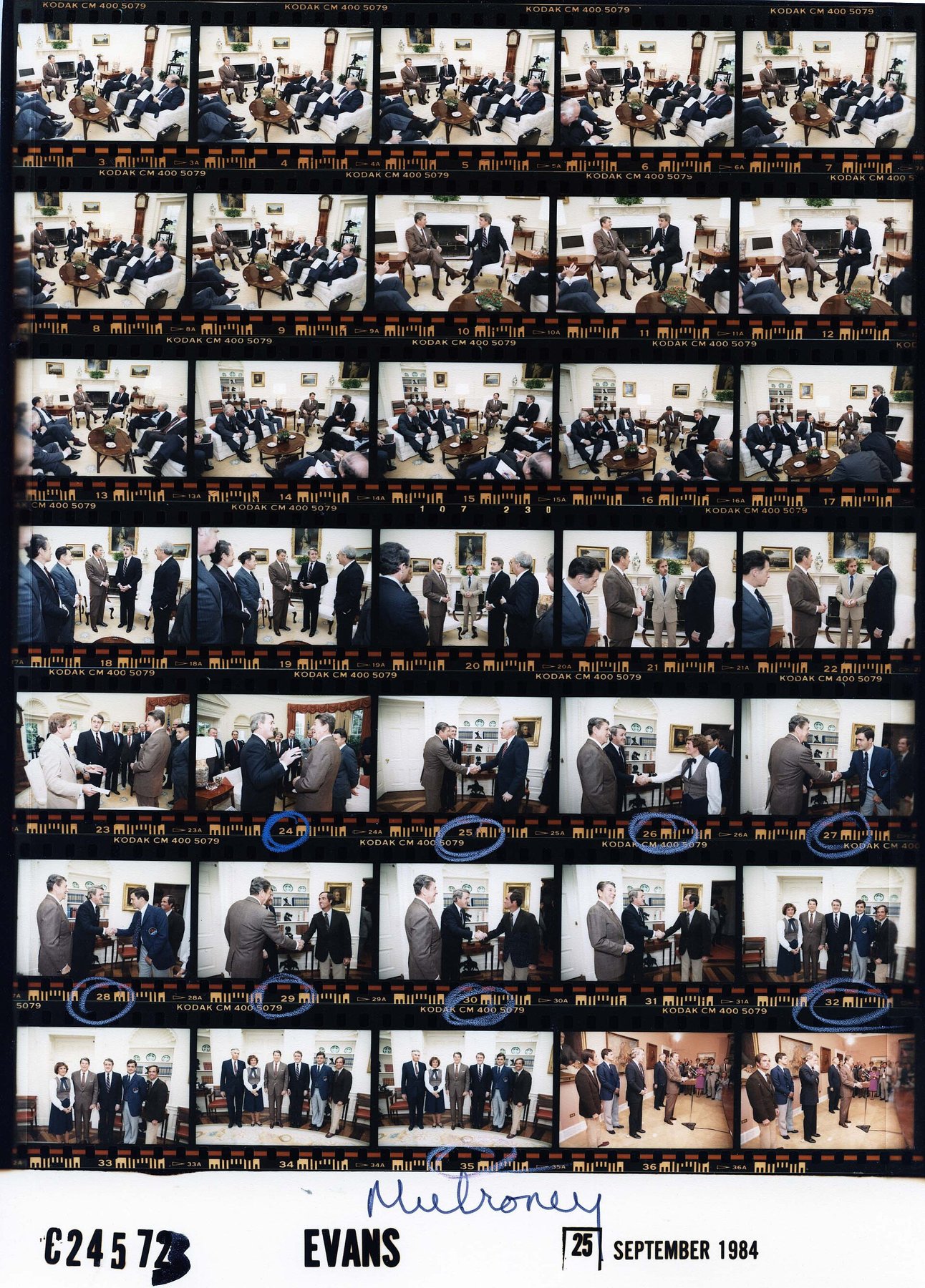 Historical contact sheet showing multiple photographs from a sequence.
