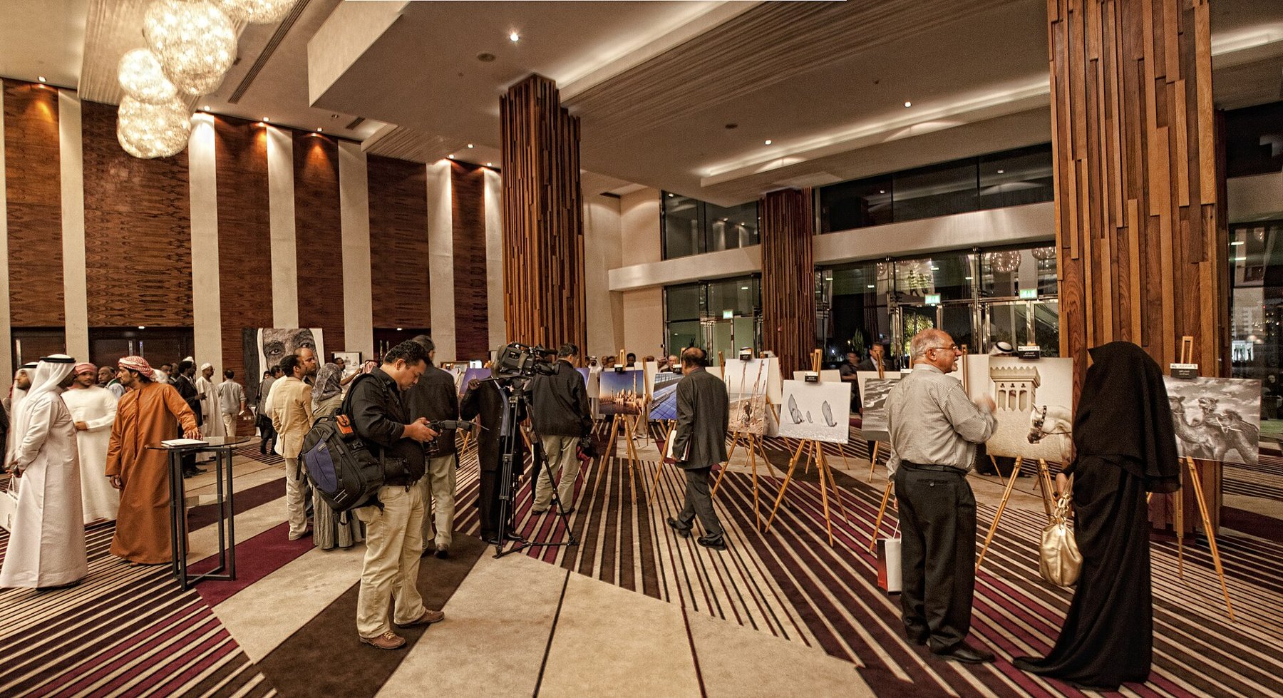 Large photographs in an exhibition with room to step back.